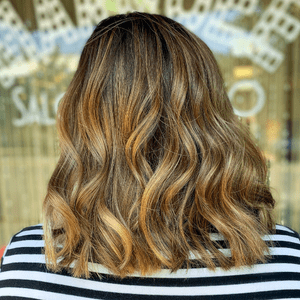 Autumn Trend Hair Model depicting lowlight hair color trend